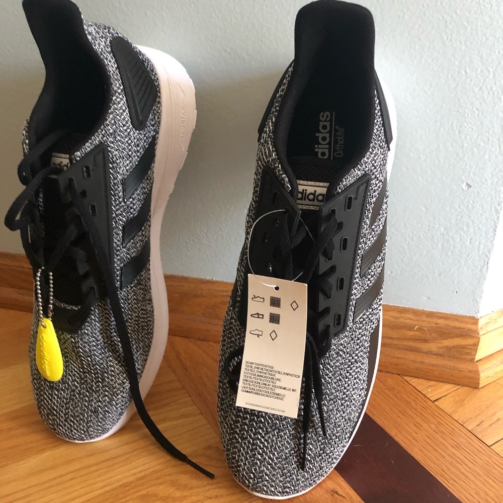Never worn adidas men shoes perfect condition